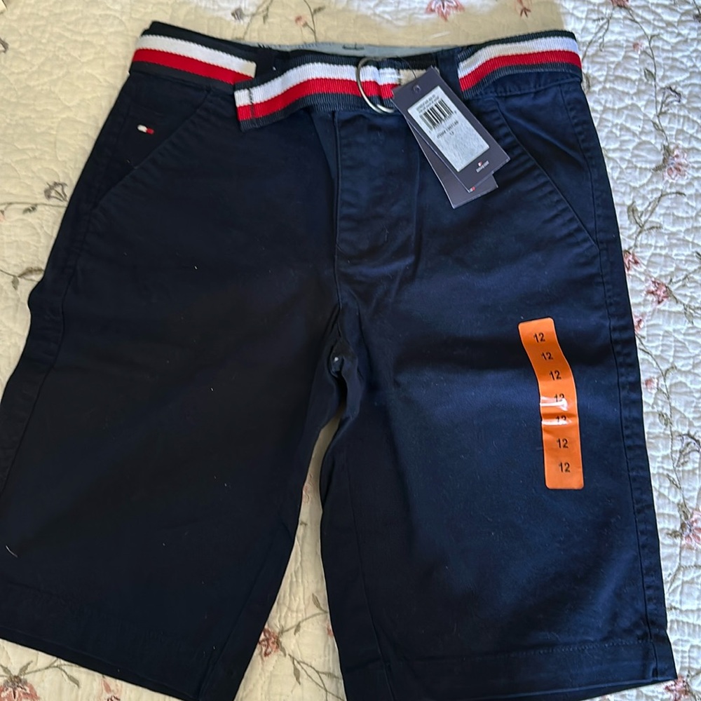 Brand new Tommy Hilfiger boys shorts with cloth belt. New with tags, navy blue